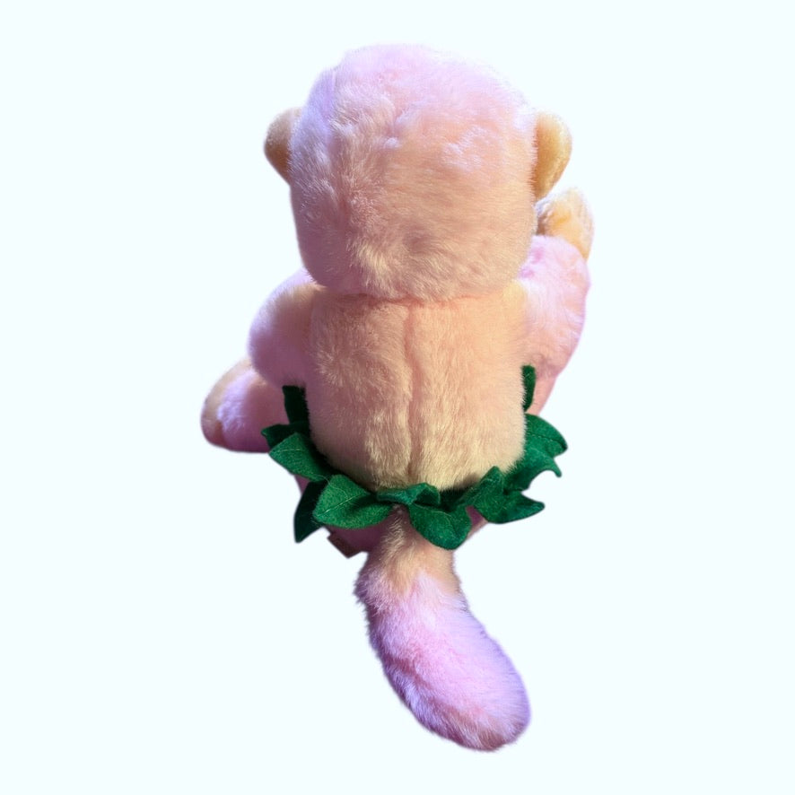 Vintage Preowned Royal Plush Pink Monkey Eating a Banana and Wearing a Leafy Green Skirt