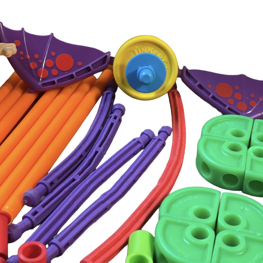 Tinkertoys Lot of 136 Multicoloured Plastic Pieces including Superhero Figure