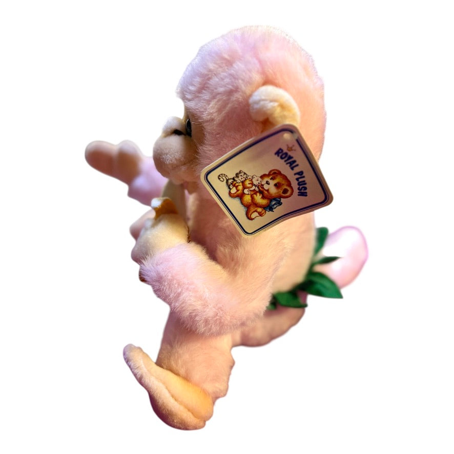 Vintage Preowned Royal Plush Pink Monkey Eating a Banana and Wearing a Leafy Green Skirt