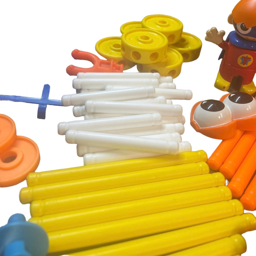 Tinkertoys Lot of 136 Multicoloured Plastic Pieces including Superhero Figure