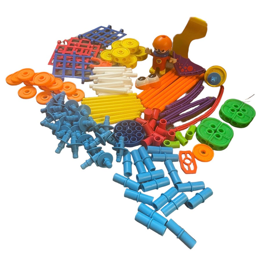 Tinkertoys Lot of 136 Multicoloured Plastic Pieces including Superhero Figure