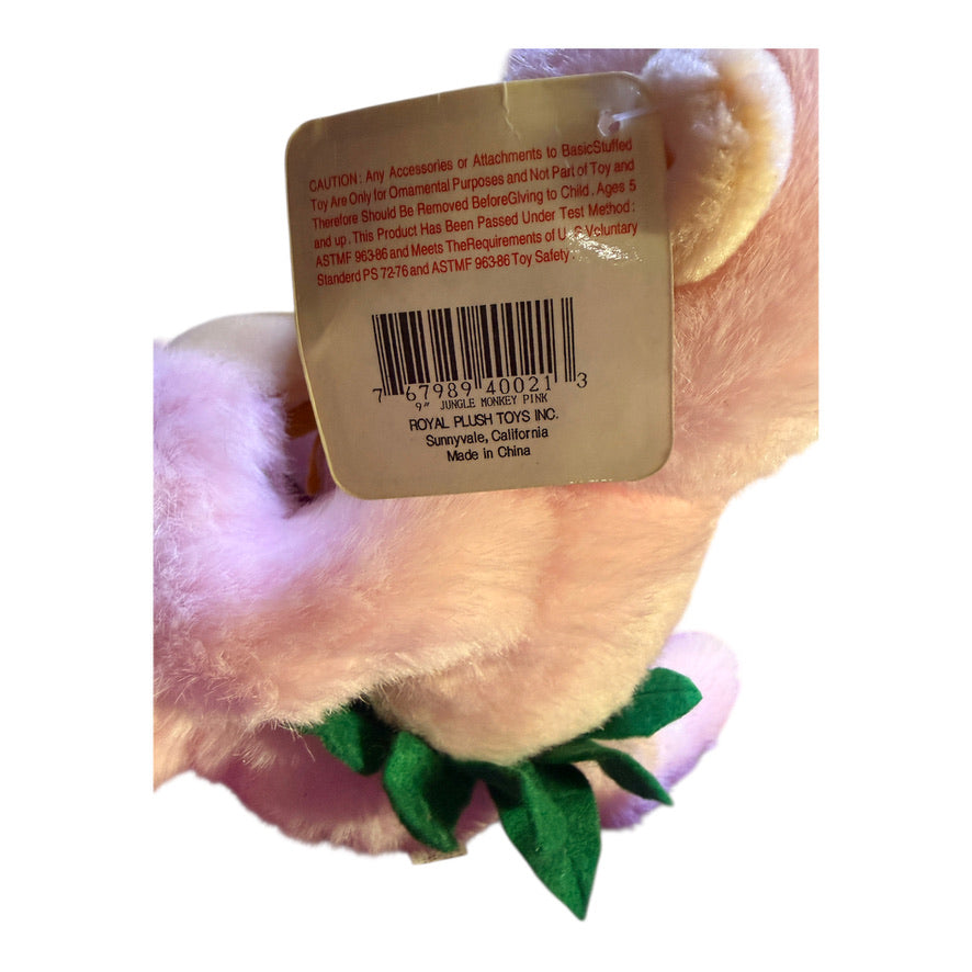 Vintage Preowned Royal Plush Pink Monkey Eating a Banana and Wearing a Leafy Green Skirt